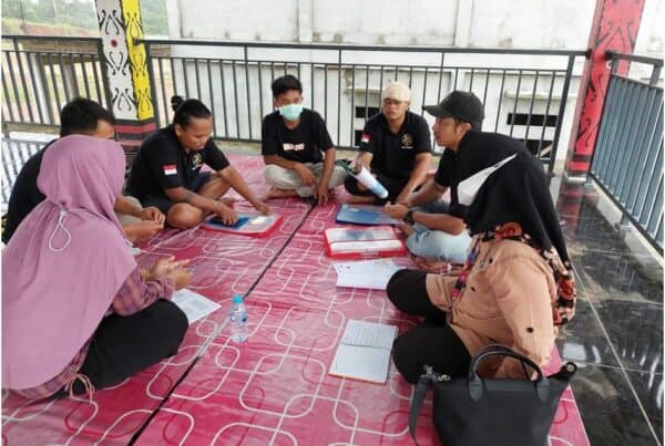 Kegiatan Evaluasi Unit Intervensi Berbasis Masyarakat (IBM) di Aula Serbaguna Desa Anjungan Dalam Kabupaten Mempawah